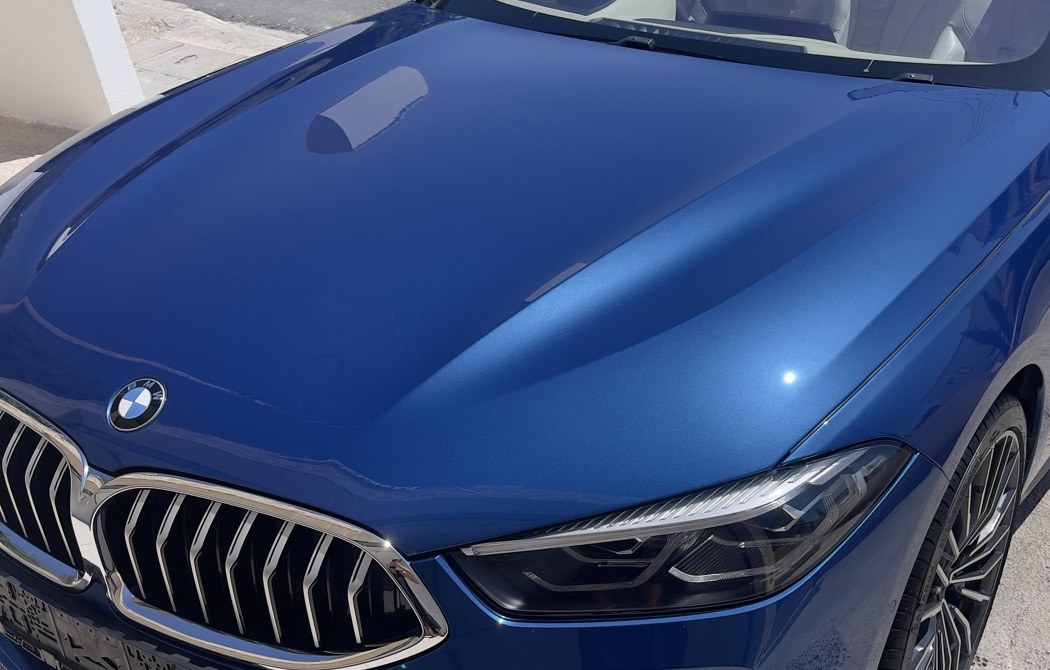 Close-up of ceramic-coated hood gloss and reflection, PG Detailing
