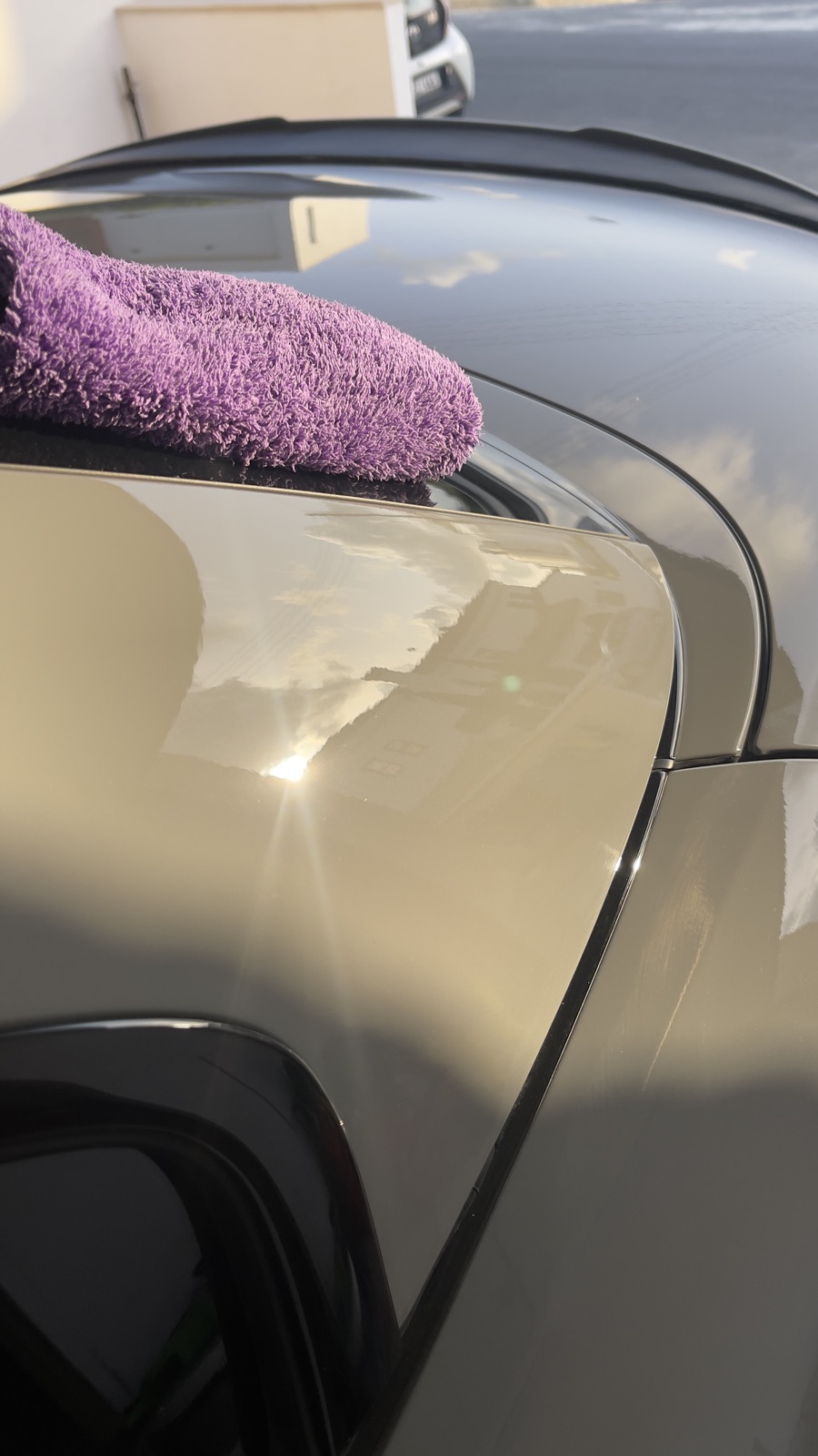 Ceramic-coated exterior panel, gloss finish reflecting the sky
